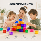Kind bouwt toren met magnetische transparante blokjes