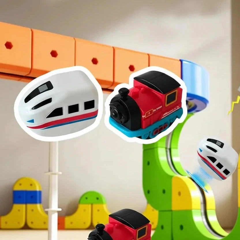 Elektrische trein in gebruik op magnetische avontuurbaan met bochten en rails